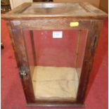 A small early 20th century oak and glazed freestanding table top curiosity display cabinet, 46 x