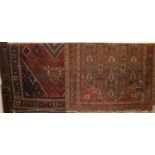 A Persian woollen red and blue ground Shiraz rug, 190 x 135cm; together with a Persian woollen red