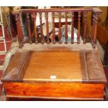 A Victorian mahogany slope front hinge top table clerk's desk, with spindle turned back (spindles