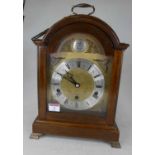 A 20th century mahogany cased bracket clock, in the 18th century style, the silvered chapter ring
