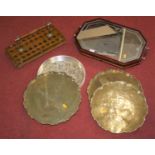Three Indian brass trays, together with three further stands