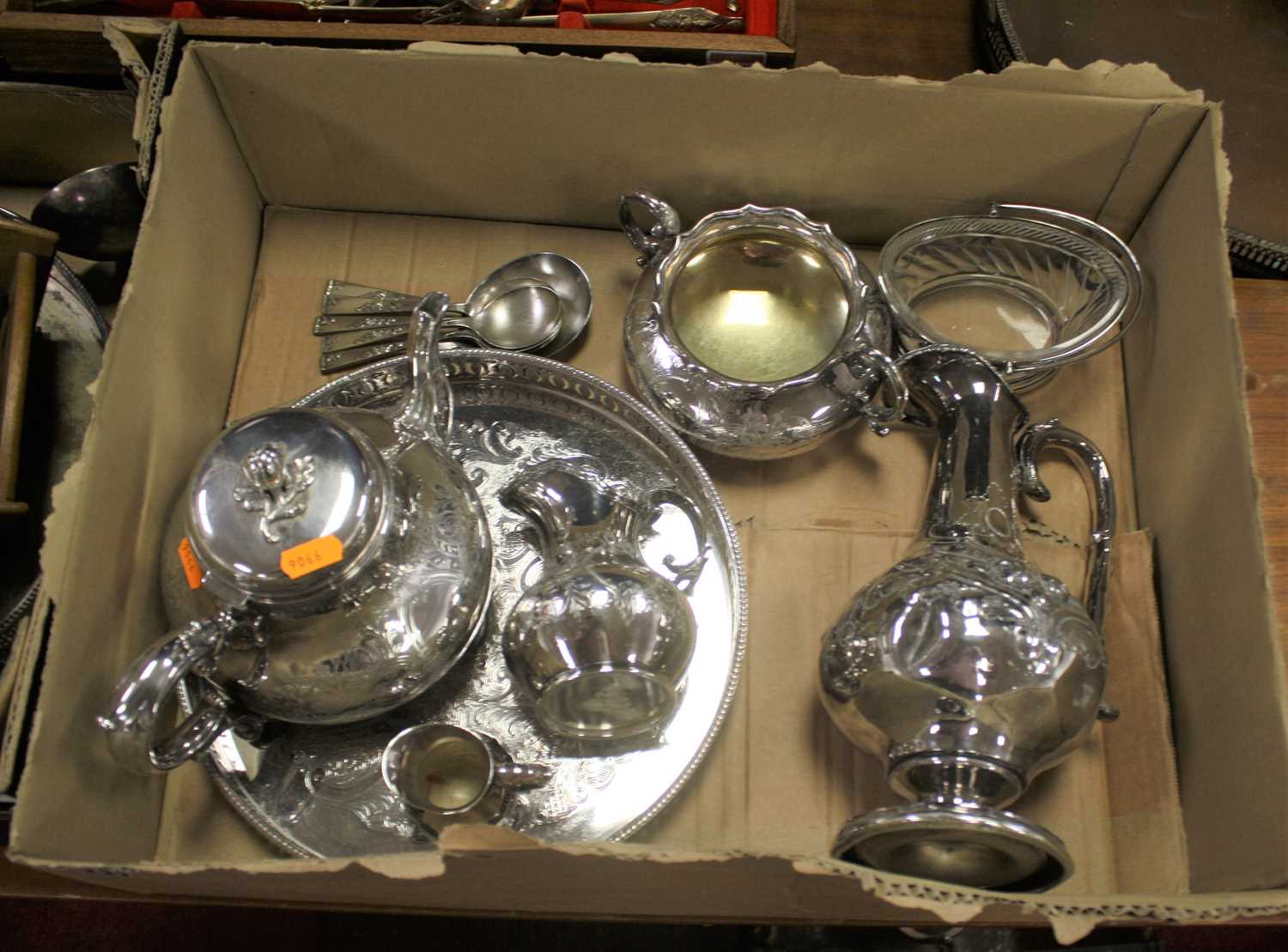 A box of silver plated items to include an Elkington part tea service