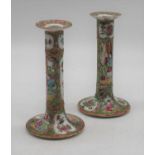 A pair of Chinese Canton table candlesticks, h.19cmOne is chipped to the sconce.