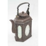 A Chinese export bronze alloy teapot of slab sided hexagonal form, each panel depicting various