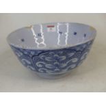 An 18th century English delftware bowl, dia.27cm (a/f)