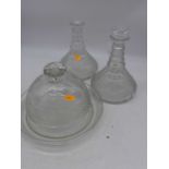 A pair of Regency glass decanters, each with bands of diamond-cut decoration, h.22cm; together