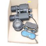 A pair of Micnon 7x50 field binoculars, No.702686; together with a Rodenstock Apo/Romar 480mm camera