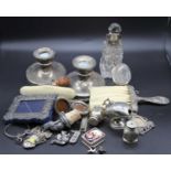 A collection of miscellaneous items to include silver dwarf table candlestick, silver mounted