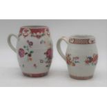 An 18th century Chinese famille rose porcelain tankard, h.48cm; together with another similar (a/