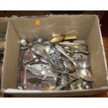 A box of silver plated cutlery to include serving spoons and table forks