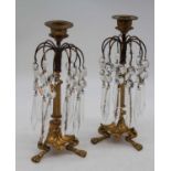 A pair of early 20th century French cast gilt brass and crystal glass drop table lustres, each