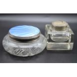 A George V silver dressing table jar having squat glass body with silver and blue guilloche