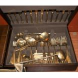 A canteen of brass cutlery, cased, together with various other brass cutlery