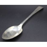 A George III silver table spoon in the Old English pattern with bright cut engraved decoration and
