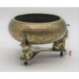 A Chinese export brass jardiniere, of squat circular form, having engraved floral decoration,