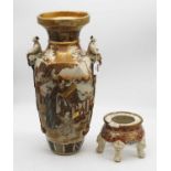 A large Japanese Meiji period satsuma vase, of hexagonal baluster form, having twin figural handles,