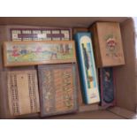 A collection of vintage games, to include chess pieces and cribbage boards