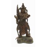 A Chinese bronzed figure of a soldier, h.31cmVery worn and pitted, flaky remains of gilt surface,