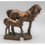 An Austin Sculpture bronzed resin model of a horse and foal, on naturalistic base, h.32cm