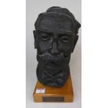 A 20th century plaster portrait bus of Elgar, signed Sheila A Scott, upon a pine plinth, h.31cm