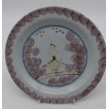 An English delftware side plate, probably Bristol, sponge decorated in manganese, dia.17cm (a/f)