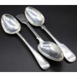 A Victorian silver table spoon in the Old English pattern together with two silver table spoons in