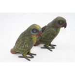 In the manner of Bergmann, a pair of cold painted models of parrots, height 15cm