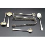 A pair of George III silver sugar tongs with bright cut engraved decoration, and one other pair of