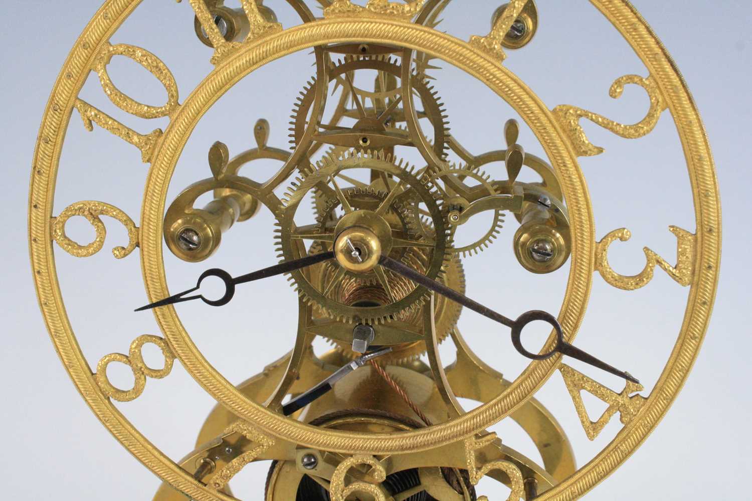 John Pace of Bury St Edmunds - a brass skeleton clock, having a textured Arabic dial, pierced blue - Image 3 of 7