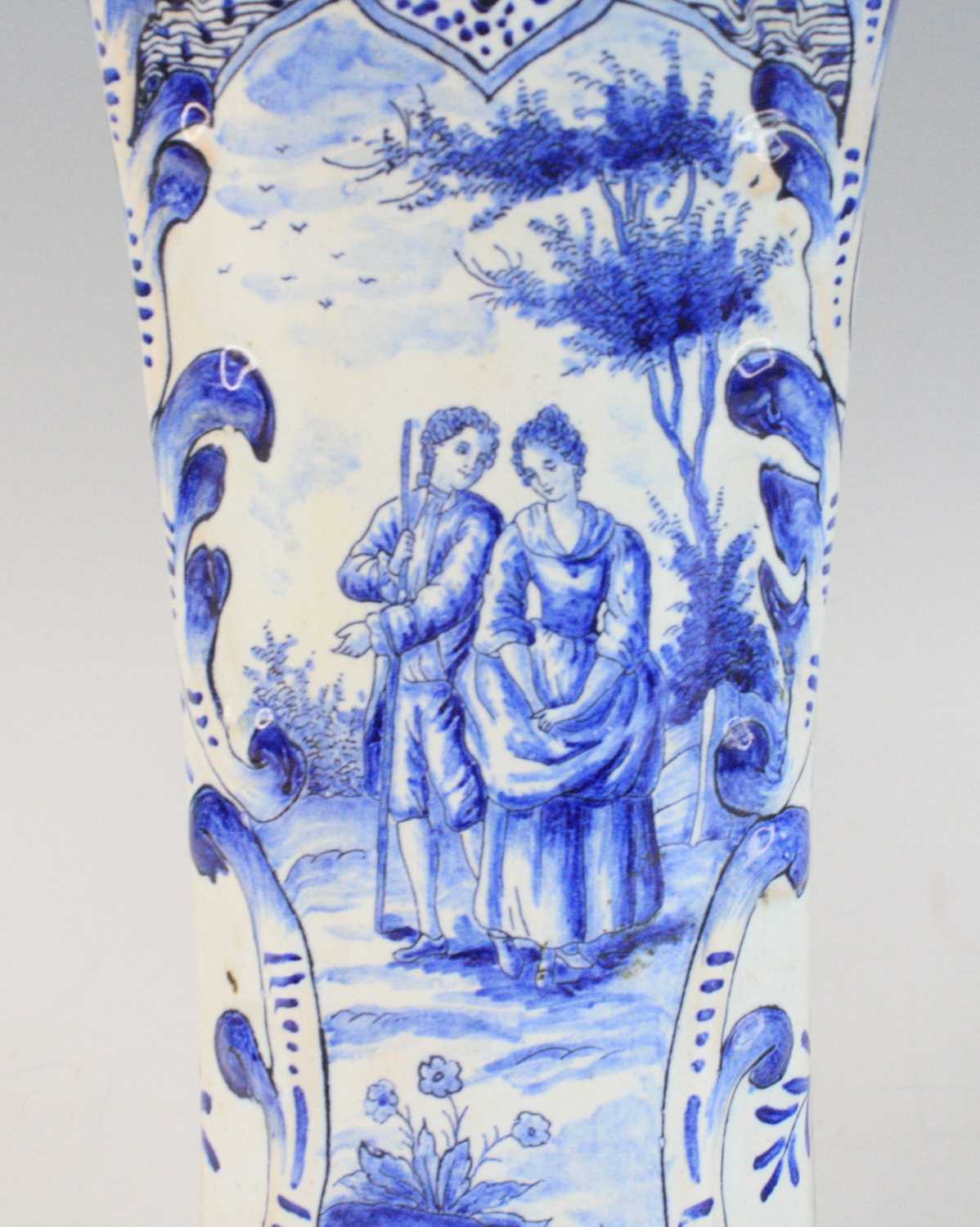 A pair of Delft blue and white trumpet vases, 19th century, each decorated with courting couples, - Image 4 of 8