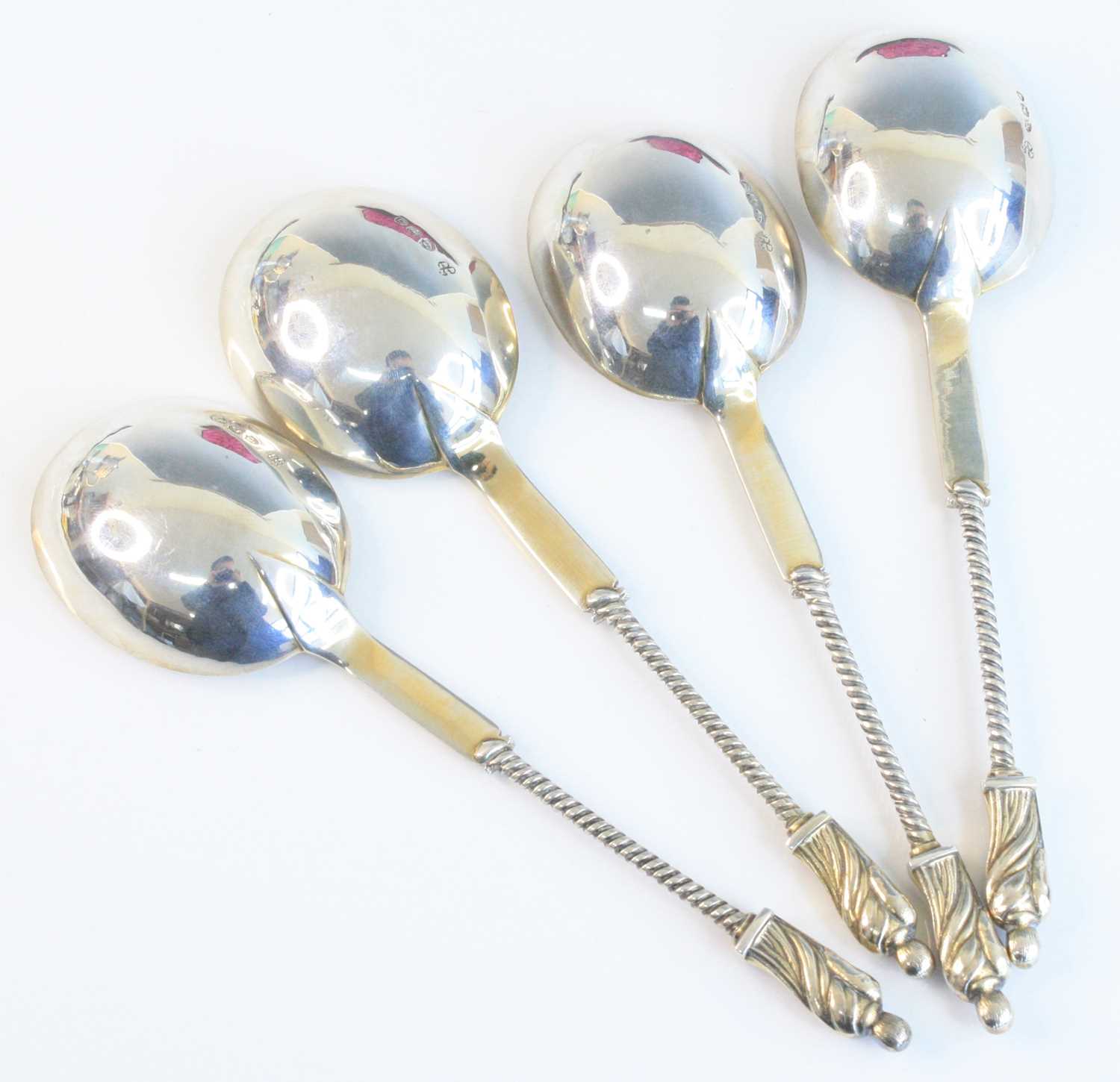 A cased set of four Victorian silver apostle spoons, having Apostle cast terminals upon spiral- - Image 5 of 8