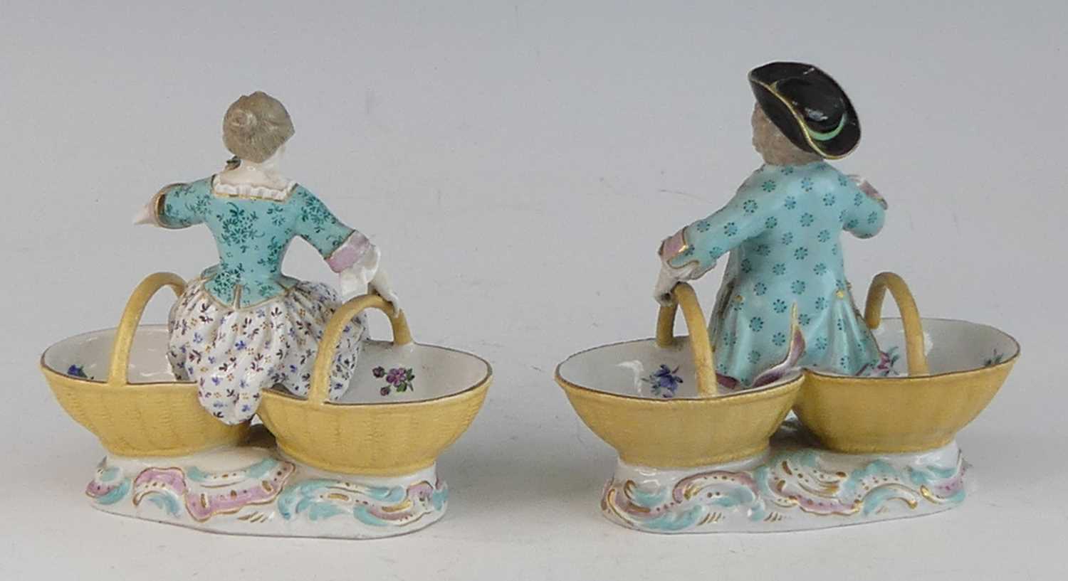 A pair of Meissen porcelain figural table salts, late 19th century, each shown in 18th century - Image 2 of 4