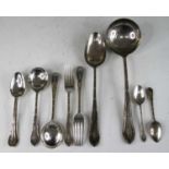 A Walker & Hall silver part cutlery suite, each piece having crested terminal, comprising four table