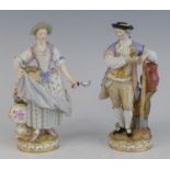 A pair of Meissen porcelain figures of gardeners, late 19th century, each shown in 18th century