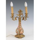 A Derby porcelain twin branch table candelabrum, early 19th century, of baluster form, decorated