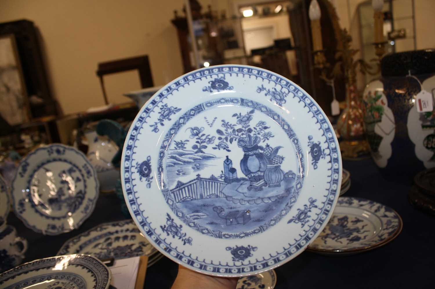 A collection of 18th century Chinese export porcelain plates and dishes, to include enamel decorated - Image 6 of 23