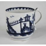 A Lowestoft porcelain coffee can, circa 1770, decorated with Chinese architecture, h.6cmIn good