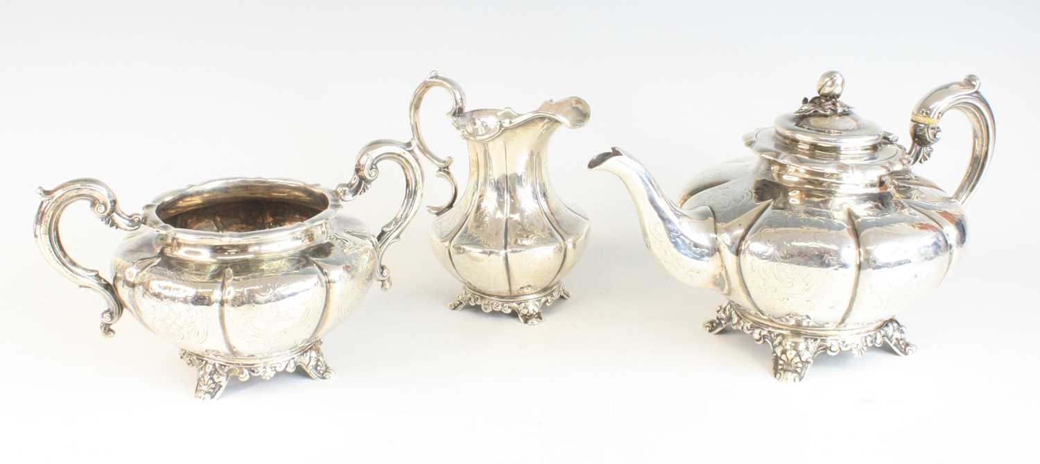 A Victorian silver three-piece tea set, comprising teapot, cream jug and sugar bowl, each piece of