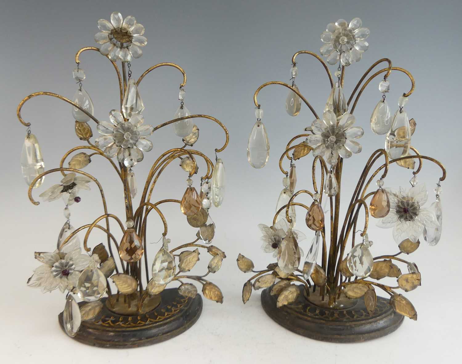 In the manner of Maison Baguès - a pair of early 20th century French gilt metal and moulded glass