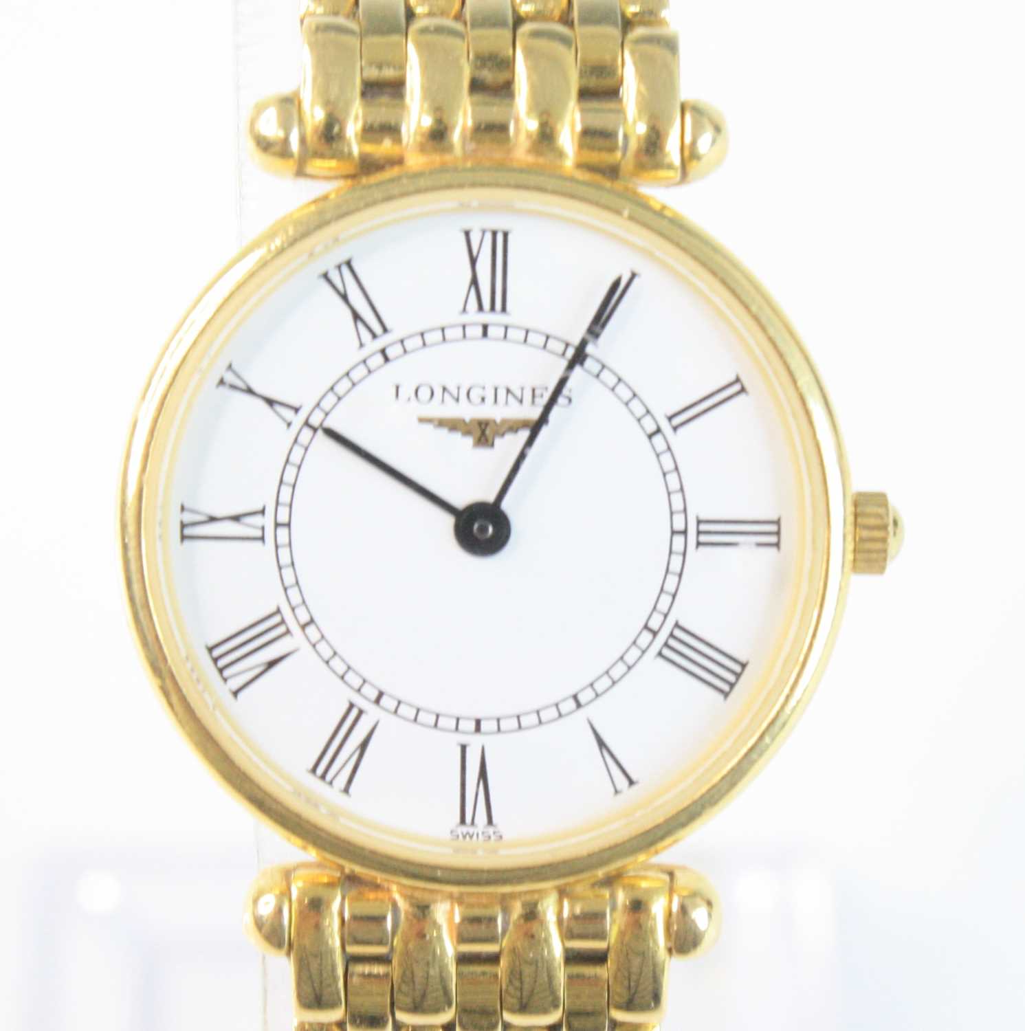 A lady’s 18ct yellow gold Longines ‘Agassiz’ quartz wristwatch, with round white Roman dial and