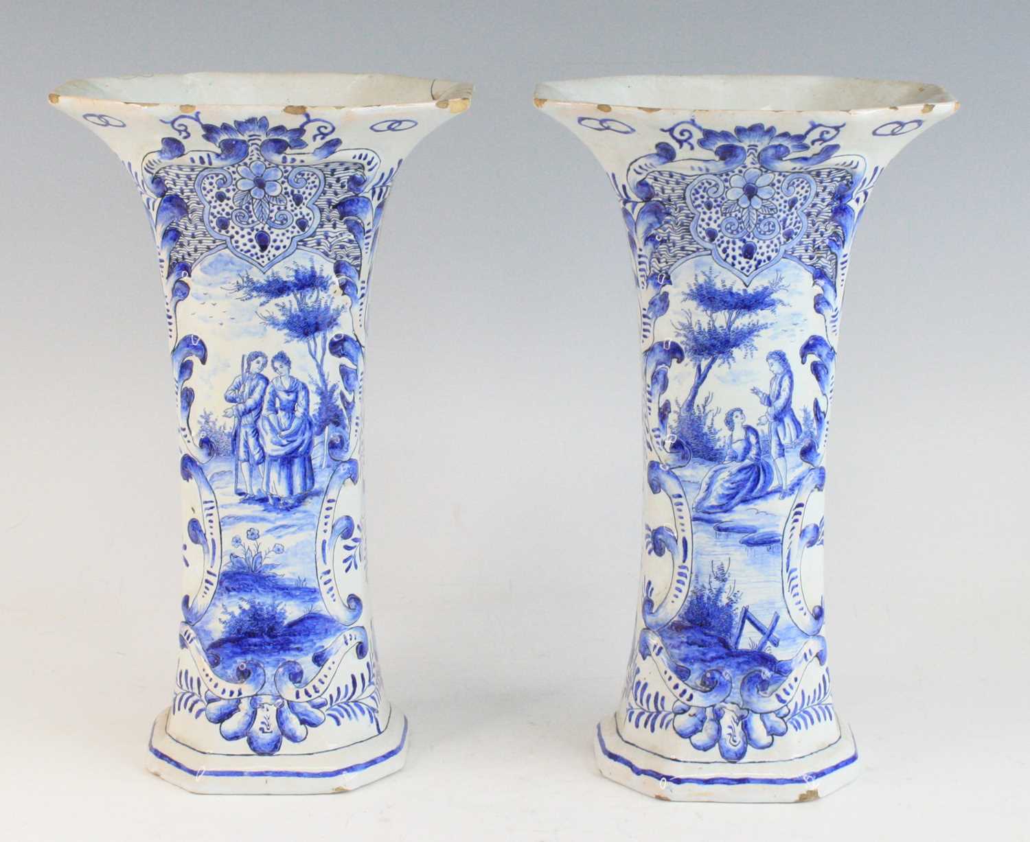 A pair of Delft blue and white trumpet vases, 19th century, each decorated with courting couples, - Image 2 of 8