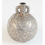 A late 19th century Chinese silver prunus blossom bottle vase, of bulbous twin handled form,