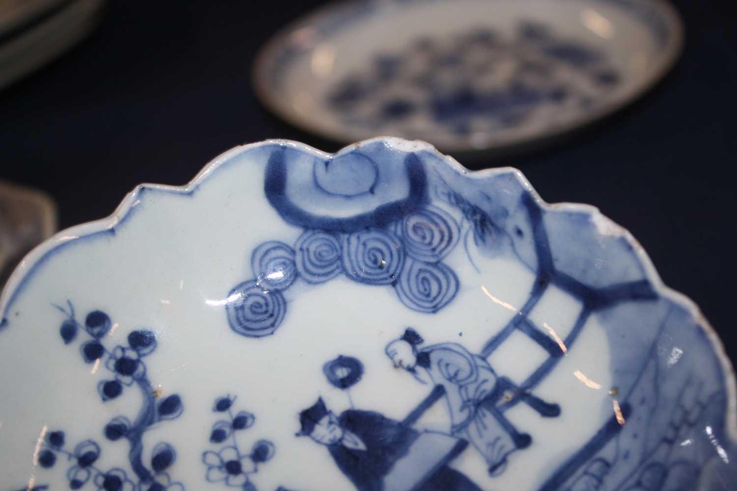 A collection of 18th century Chinese export porcelain plates and dishes, to include enamel decorated - Image 2 of 23