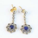 A pair of late Victorian yellow and white metal circular cluster drop earrings, each featuring a