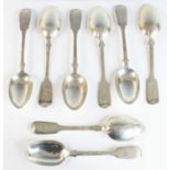 A matched set of eight Victorian silver tablespoons, in the Fiddle pattern, six being by H J