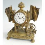 A late 19th century French gilt bronze mantel clock, the case surmounted with a classical style urn,