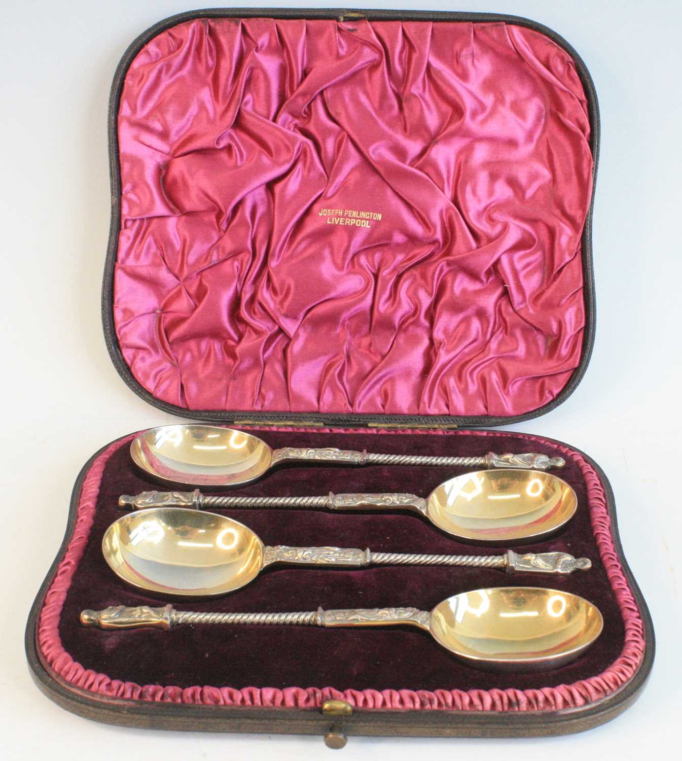 A cased set of four Victorian silver apostle spoons, having Apostle cast terminals upon spiral-