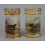 A pair of Royal Worcester vases, circa 1903, shape 689, each decorated with highland cattle and