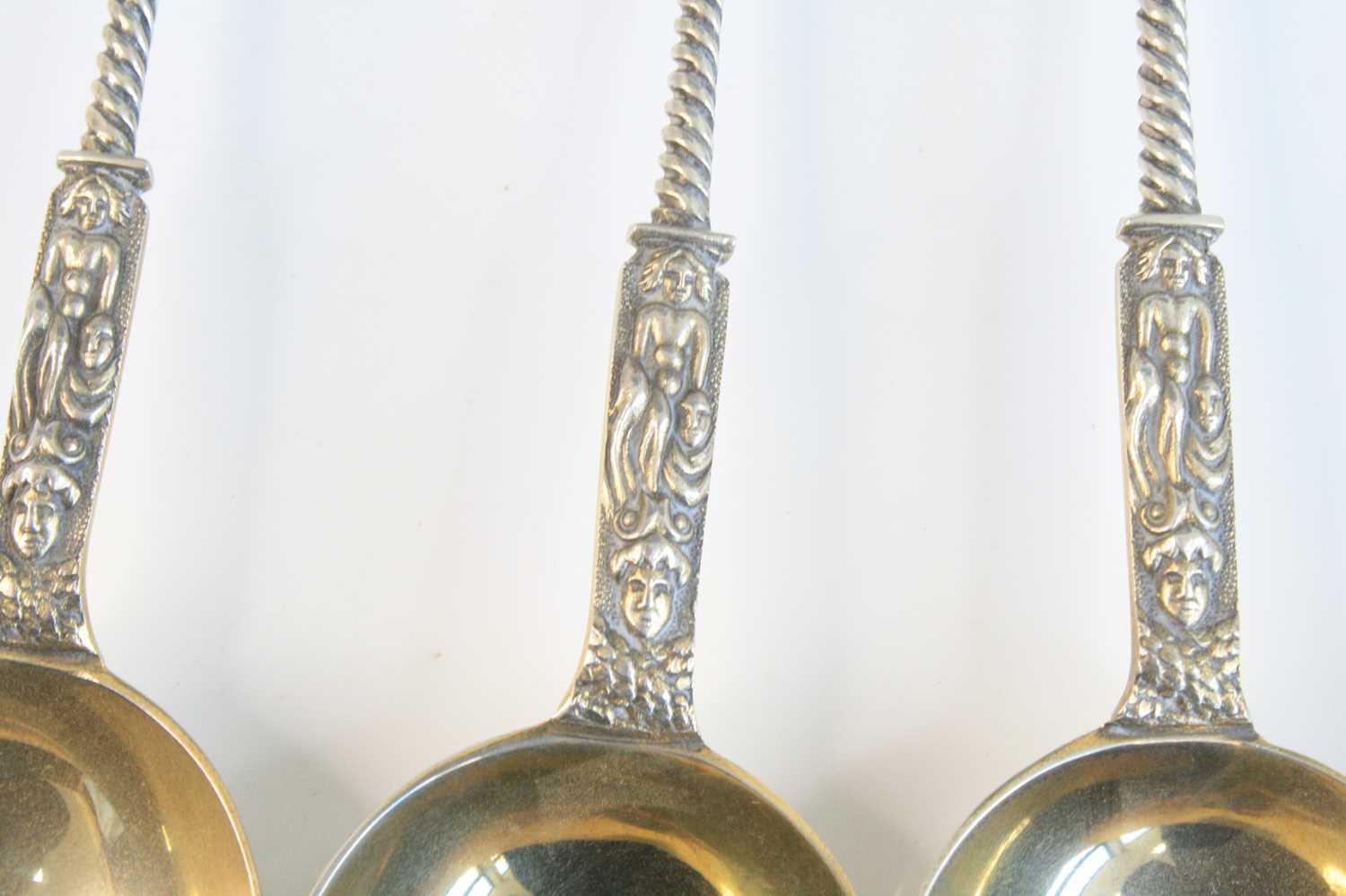 A cased set of four Victorian silver apostle spoons, having Apostle cast terminals upon spiral- - Image 4 of 8