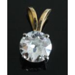 A yellow and white metal diamond single stone pendant, the transitional round brilliant cut